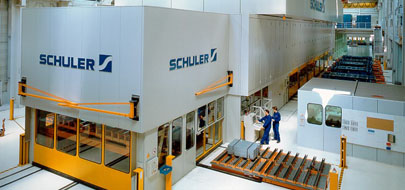 Crossbar press with hydraulic bed cushion for aluminum outer-skin panels