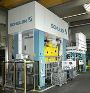 Servo press in monoblock design with modular electronic tri-axis transfer. Press force: 6,300 kN